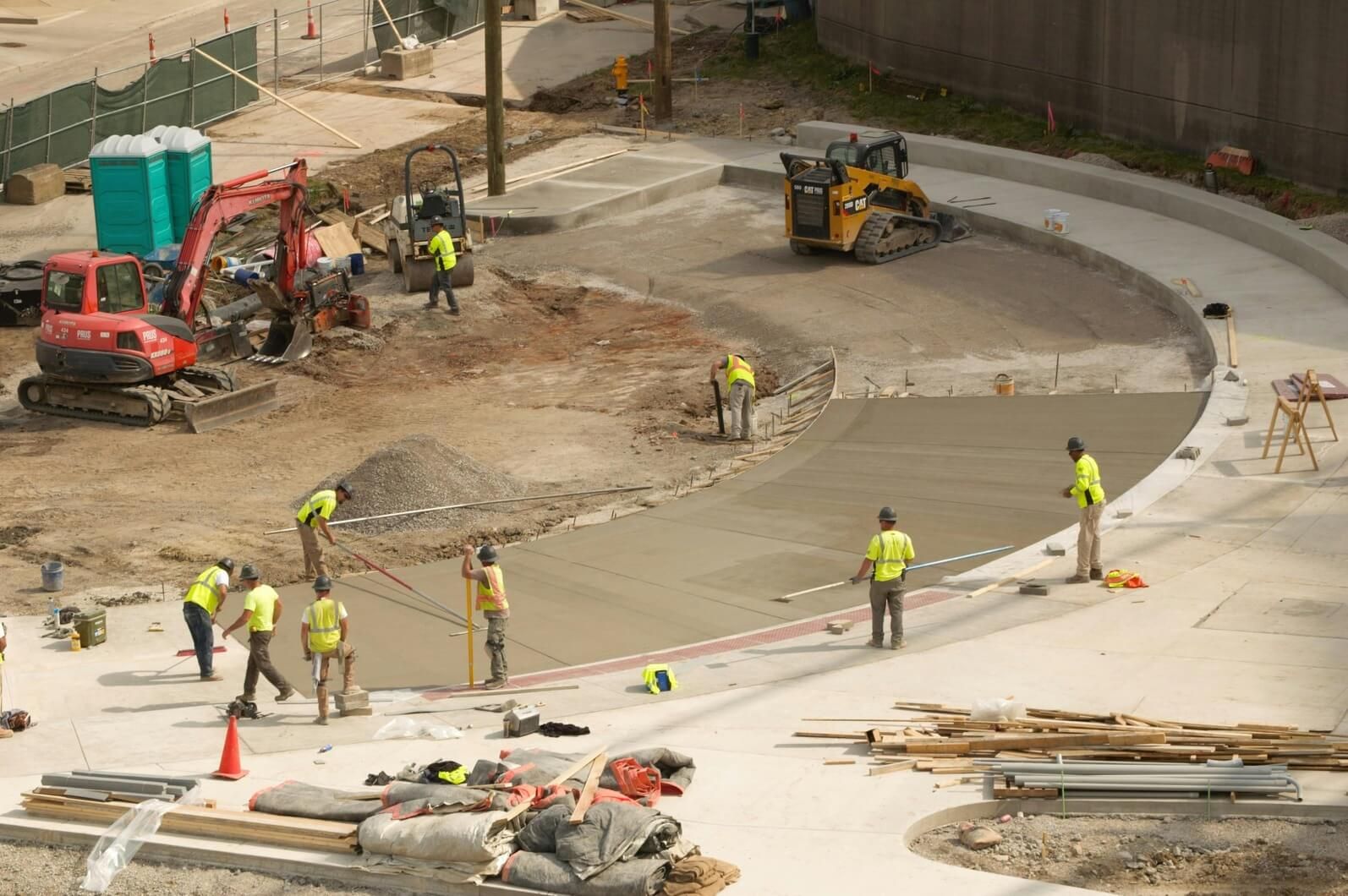 Lumix crew finishing a curved concrete pour